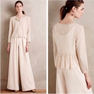 Anthropologie, women’s XS cardigan. Cream with metallic threading throughout.